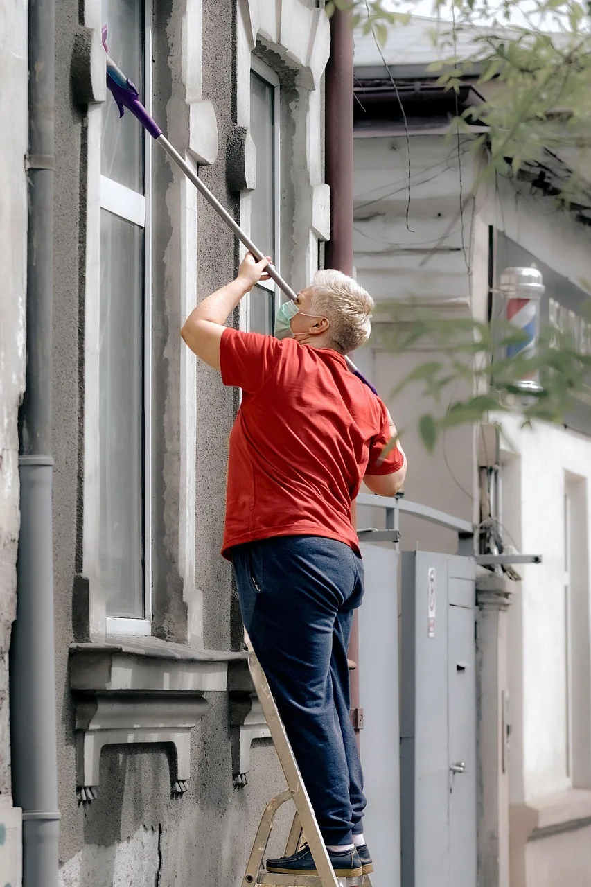 cleaning window screens outdoors